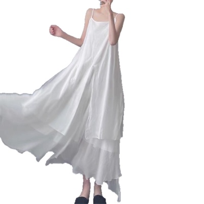 不规则飘逸吊带连衣裙女夏季设计感小众森系文艺范气质大摆长裙子